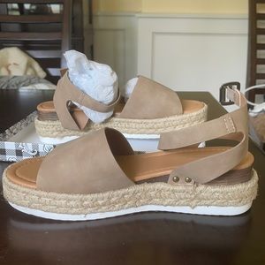 Never worn platform sandals!